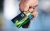 Person holding a bp Plus card and some car keys