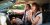 Young couple shares lighthearted moments and laughter during their adventurous car journey