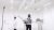 A person analyzes a model in a white room