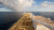 Pipes with NGL are attached to the top of a boat sitting on dark blue water