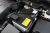 Car battery under the hood.